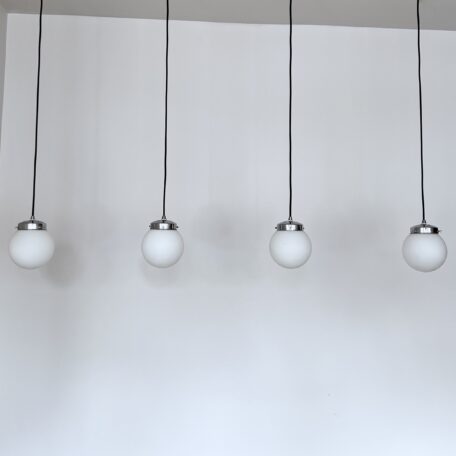 Four White Matte Globe Shades